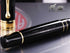 Aurora Optima - Resin Black w/ Gold Plated Trim Rollerball Pen - AU-975N by Disney